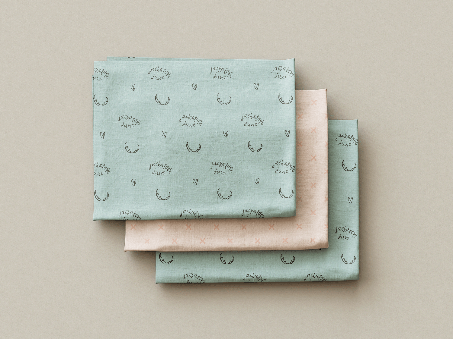 A digital mockup of the jackalope june fabric swatches designed by Aprille.